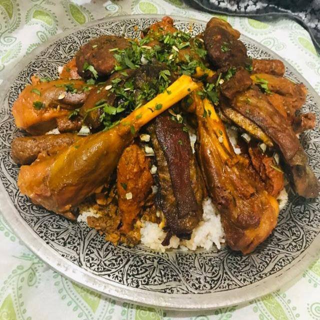 Wazwan feast served on a traditional trami